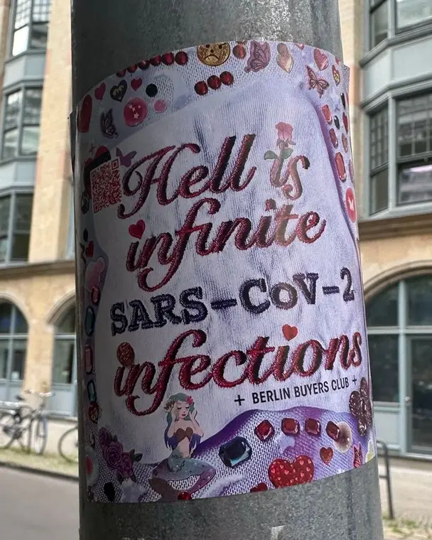 Sticker on a lamppost: Hell is infinite SARS-CoV-2 infections